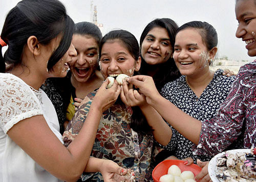 Students celebrate victory in ICSE board exam. PTI 500