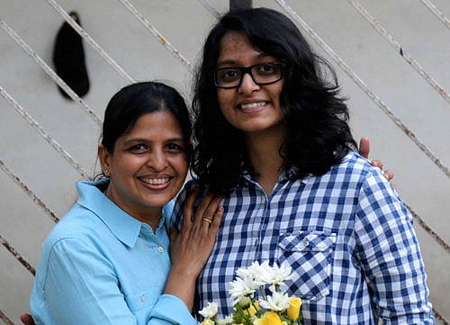 Adyaa Maddi, student of Smt. Lilavatibai Podar High School in Mumbai being greeted by her mother on Friday. Maddi has taken top position in the Class XII, Indian School Certificate Examinations, 2016. PTI Photo
