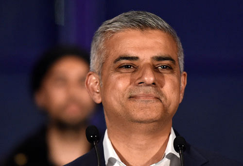 Sadiq Khan, Britain's Labour Party candidate for Mayor of London, smiles following his victory in the London mayoral election at City Hall in London, Britain, early May 7, 2016. REUTERS photo