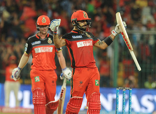 The RCB skipper entered into record books as he became the only batsman to score two tons in a single IPL season. DH Photo
