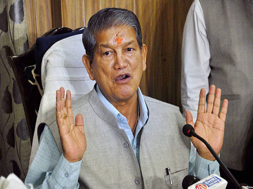The verdict will come a day ahead of the floor test in the state Assembly for sacked chief minister Harish Rawat. PTI file photo