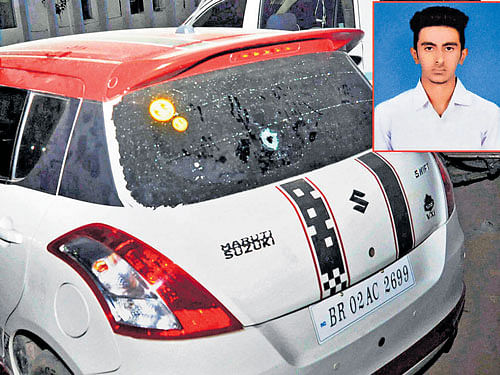 The car in which the class XI student Aditya Sachdev (inset) was shot dead by JD(U) MLC Manorma Devi's son for overtaking his car in Gaya, Bihar, on Saturday night. PTI