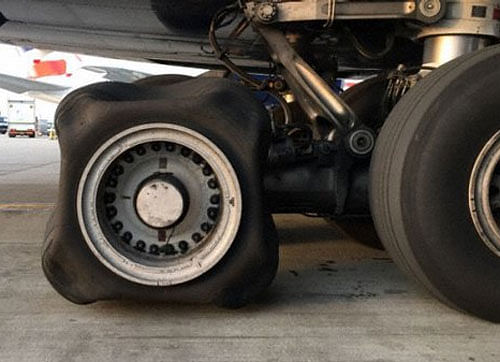 The deflated tyre with a square shape was part of the landing gear on the flight BA-32 arriving from Hong Kong on Friday. Photo courtesy: Twitter @NZStuff