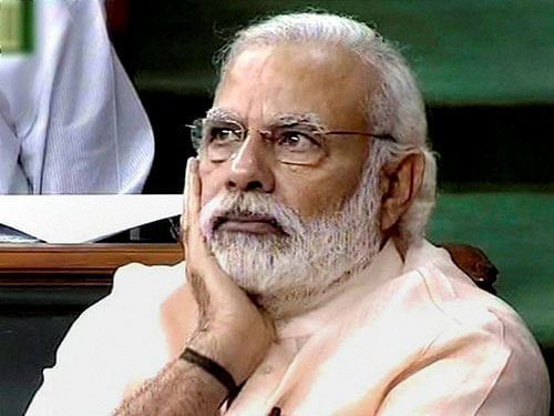 Prime Minister Narendra Modi in the Lok Sabha in New Delhi on Wednesday. PTI Photo