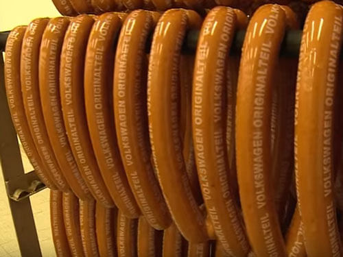 Under the supervision of Lo Presti, some 30 kitchen staff participate each day in the industrial-scale production of 30,000 curry sausages, which is also a favourite snack at the local football stadium of VfL Wolfsburg. Videograb