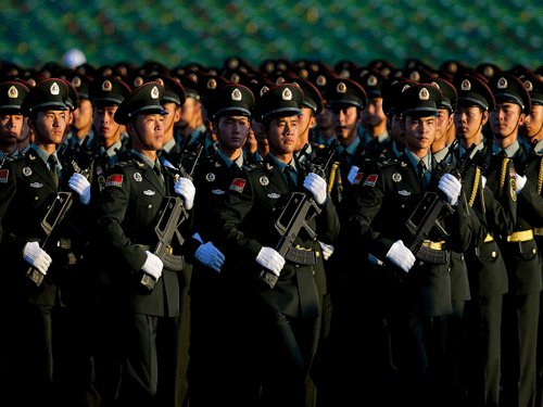 By 2020, the PLA will have finished mechanisation of all forces and made important progress in incorporating information and computer-technology, the document said. Reuters file photo.
