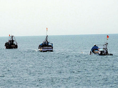 Fishing boat Bhagya Nidhi being towed to safety.