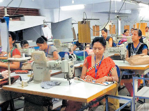 Women learn tailoring in Ahmedabad.