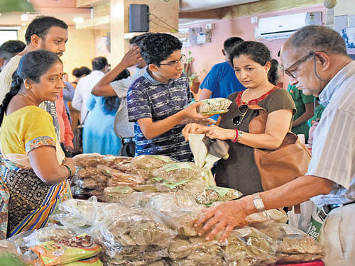 Visitors at one of the stalls at the Millet Mela which began in  Bengaluru on Saturday. DH photo