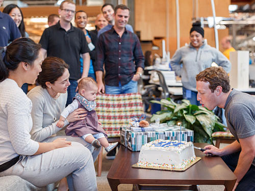 Facebook CEO and Founder Mark Zuckerberg had a special guest at his company headquarters to ring in his birthday - his baby daughter Max!