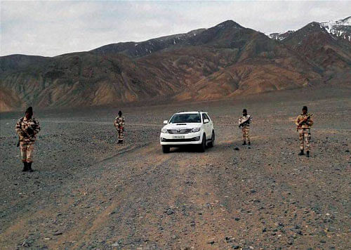 ITBP troops with their brand new SUV at forward areas along the China border. PTI Photo