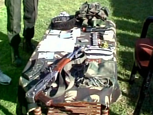 One AK 56, huge cache of ammunition,magazine and some docs recovered from terrorist:  ANI