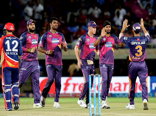Rising Pune Supergiants players celebrates a wicket of Delhi Daredevils during match a IPL 2016 at the ACA-VDCA Stadium, Visakhapatnam on Tuesday. PTI Photo