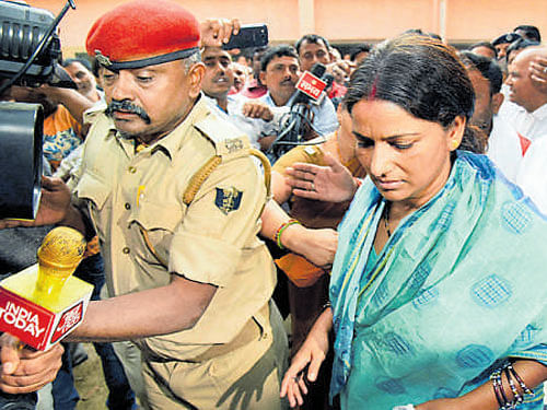Manorama Devi surrenders at a court on Tuesday. PTI
