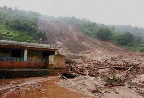 Continuous heavy rains in Assam for the last three days triggered landslides that claimed 10 lives in Karimganj and Hailakandi districts in Barak Valley. NDRF and police are undertaking rescue and relief operations. PTI file photo for representation