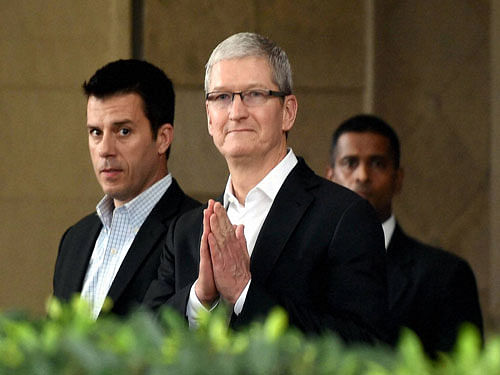 Apple's CEO Tim Cook greets in 'namaste' style at the Taj Mahal Palace hotel in Mumbai on Wednesday. PTI Photo