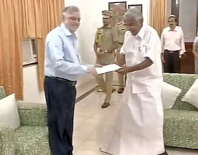 Chandy met Governor P Sathasivam at the Raj Bhavan and handed over his resignation. ANI