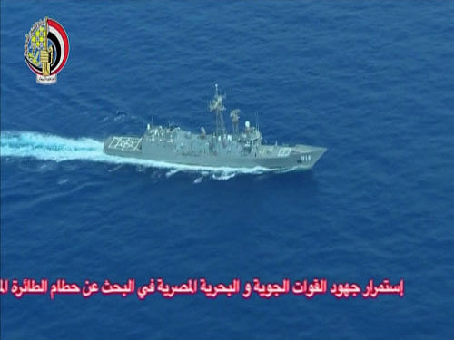 An Egyptian military search vessel takes part in a search operation for the EgyptAir plane that disappeared in the Mediterranean Sea. Smoke was detected in the toilet and the aircraft's electrics, just minutes before the signal was lost, according to data published on air industry website the Aviation Herald, which said it had received flight data filed through the Aircraft Communications Addressing and Reporting System (ACARS) from three independent channels. Reuters photo