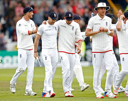 England's James Anderson celebrates with Alastair Cook at end of the match Action Images via Reuters