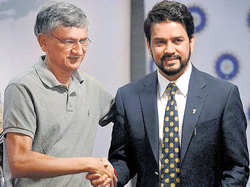 New beginning: BCCI secretary Ajay Shirke (left) and president Anurag Thakur greet each other in Mumbai on Sunday. PTI