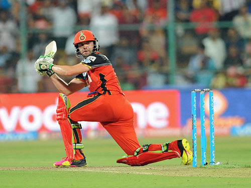AB de Villiers plays a shot during the first qualifiers cricket match between Royal Challengers Bangalore and Gujarat Lions at The M. Chinnaswamy Stadium. DH photo