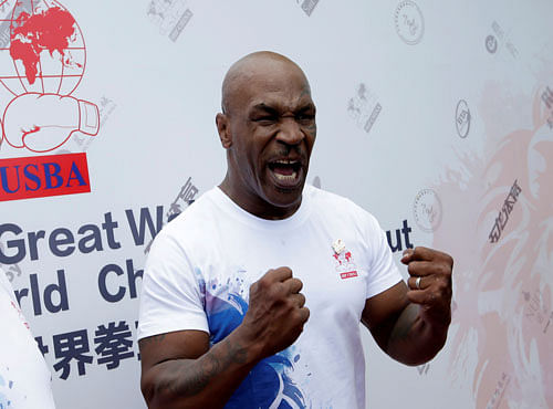Former boxer Mike Tyson reacts as he speaks to the media on the outskirts of Beijing. Reuters photo