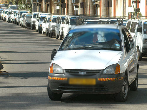 The agitating drivers urged the officials to stop targeting them. On April 2, the government introduced new rule, Karnataka On-Demand Transportation Technology Aggregators Rule-2016. But the taxi aggregators - Ola and Uber - did not bother to get the requisite license to operate the service. As a result the department started to penalise the cab owners for violation of permit condition. DH file photo