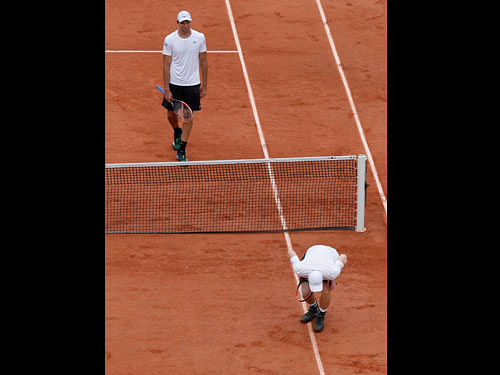 So close: At the French Open, the umpire settles points of contention by  examining the marks in the clay. Reuters