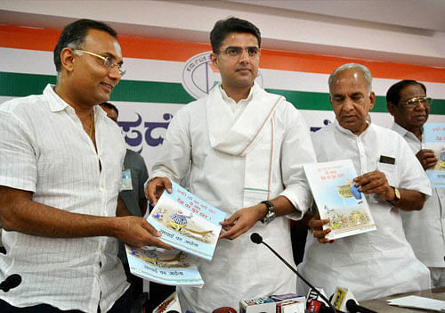 Congress leader Sachin Pilot with party leaders releasing a booklet in connection with the two years of NDA Government, at a press conference at KPCC office in Bengaluru on Saturday. PTI Photo