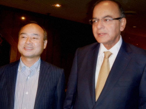 Finance Minister Arun Jaitley and Soft Bank CEO Masayoshi Son in Tokyo on Sunday. PTI Photo
