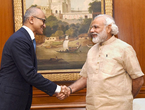Prime Minister Narendra Modi shakes hands with Microsoft CEO Satya Nadella in a meeting in New Delhi on Monday. PTI Photo