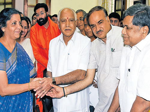 BJP candidate for the Rajya Sabha election Nirmala Sitharaman seen with BJP state  president B S Yeddurappa, Union Minister Ananth Kumar, party leaders Jagadish Shettar  and Pralhad Joshi while filing her nomination at the Vidhana Soudha on Tuesday. DH&#8200;Photo