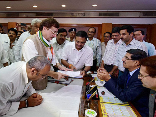 Congress candidate Vivek Tankha files his nomination for Rajya Sabha election at Madhya Pradesh Assembly in Bhopal on Monday. Former Union Minister and MP Jyotiraditya Scindia and State Congress President Arun Yadav are also present on the occasion. PTI Photo