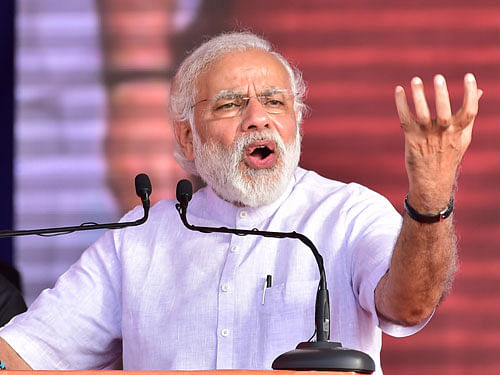 Pitching for development of Odisha, eastern Uttar Pradesh, West Bengal, Bihar and Assam, Modi said his government was committed to the welfare of the poor people who would be at the centre of all schemes. PTI Photo.