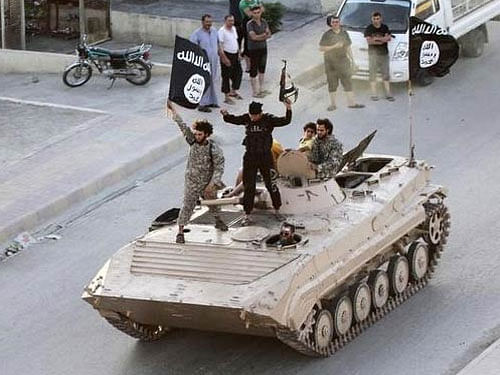 The new report, by the Center for the Analysis of Terrorism on the finances of the Islamic State, said that despite the constant airstrikes on its oil infrastructure, ISIS still has an over USD 2 billion empire and it is making up lost revenue by squeezing about 8 million people under its control through raising of taxes. Reuters file photo