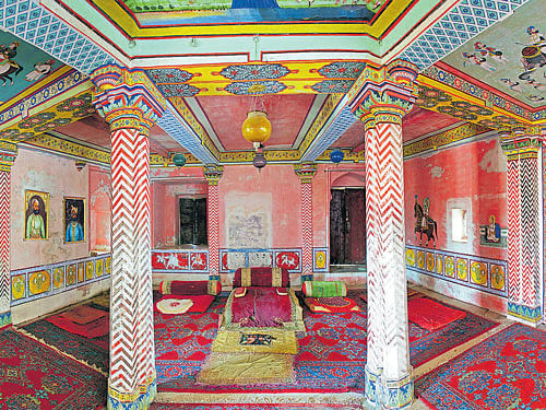 canvas Decorated interior of the 'durbar' hall inside the Juna Mahal Palace.