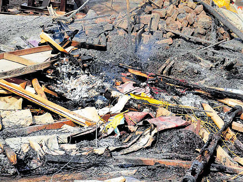 A gutted hut near Jawahar Bagh in Mathura on Friday, a day after the police-encroachers' clash. PTI