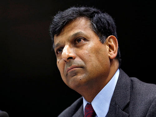 RBI Governor Rajan attends a news conference after their bimonthly monetary policy review in Mumbai. Reuters Photo.