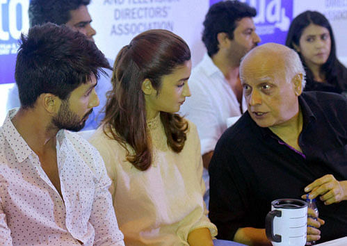 with hope:  Actors Shahid Kapoor and Alia Bhatt with filmmaker Mahesh Bhatt at a press conference organised by the Indian Film and Television Directors Association in Mumbai on Wednesday. PTI