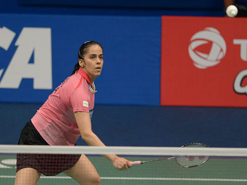 Saina was lagging initially when Jin took a 4-1 lead and held on to it till    9-7. The Indian then reeled off six points to reach 13-9 and then just zoomed ahead to pocket the first game. PTI File Photo.