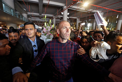 Former French soccer player and current Real Madrid's coach Zinedine Zidane arrives at the airport in Mumbai. Reuters Photo