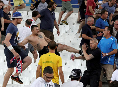 Clashes break out in the stands after the Euro 2016 Group B soccer match between England and Russia, at the Velodrome stadium in Marseille, France, Saturday, June 11, 2016. AP/PTI