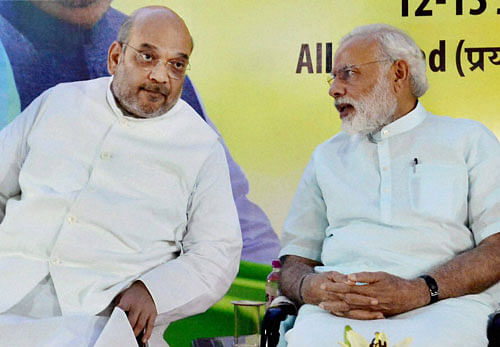 Prime Minister Narendra Modi and BJP's national president Amit Shah during the party's national executive meet in Allahabad on Sunday. PTI Photo