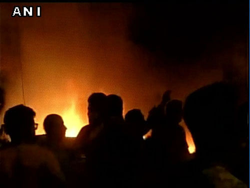 A huge posse of police personnel, geared with anti-riots equipment, were deployed in the area after protesters had last night set three vehicles on fire and resorted to stone pelting on police after the news of the desecration of the temple spread in the city. Image courtesy: ANI Twitter