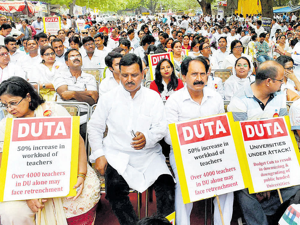 Delhi University Teachers' Association members during a protest at Jantar Mantar in New Delhi on Tuesday. DH&#8200;photo