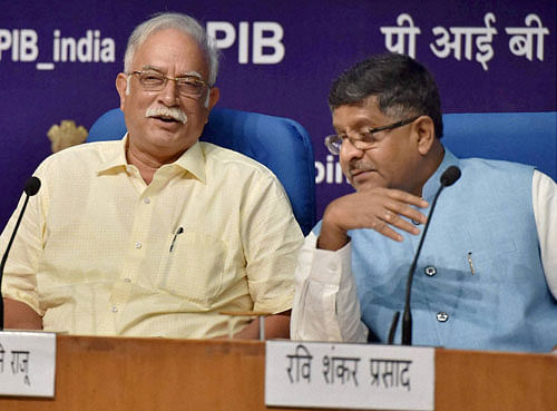 Union Civil Aviation Minister Ashok Gajpati Raju and Union Minister IT and communications, Ravi Shanker Prasad during a press conference on national civil aviation policy which approved by cabinet in New Delhi on Wednesday. PTI Photo
