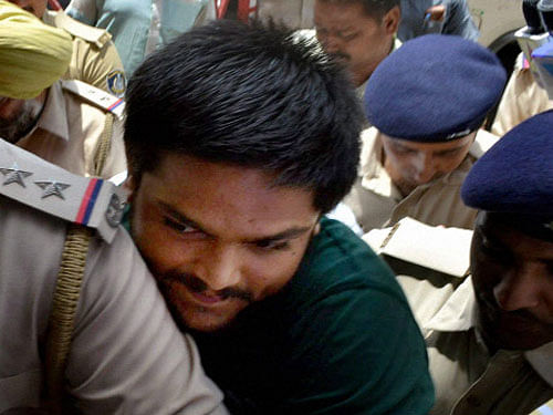 The police action drew flak from the Patidar Anamat Andolan Samiti, which spearhead the quota agitation, even as the women were later let-off and Hardik's family was released after the CM's programme ended. PTI File Photo.