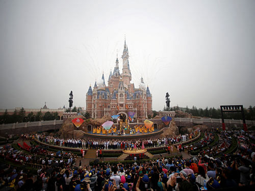 Fireworks explode over the Shanghai Disney Resort during the opening ceremony in Shanghai, China. Reuters Photo.