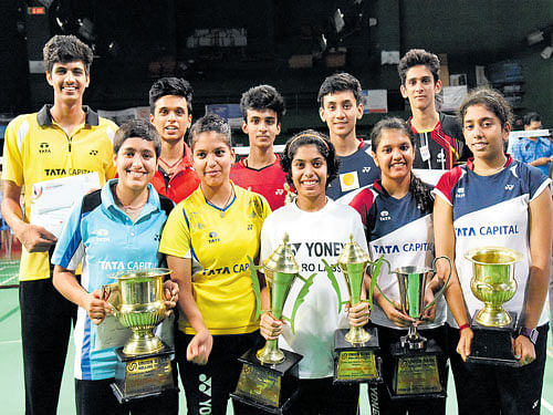 Prized possession: Winners of the 15th Union Bank All-India Junior-ranking badminton tournament. Back row (From left) Balraj Kajla&#8200;(U-19 mixed doubles), Mithun M (U-19 boys doubles), Kiran George (U-17 boys singles), Lakshya Sen (U-19 boys singles) and  Bodhit Joshi (U-19 boys doubles). Front row: Shikha Gautam (U-19 girls doubles), Mahima Aggarwal (U-19 girls' doubles), Aakarshi Kashyap (U-19 and U-17 girls' singles), Mithula UK (U-17 girls doubles) and K Ashwini Bhat (U-17 girls doubles). dh photo