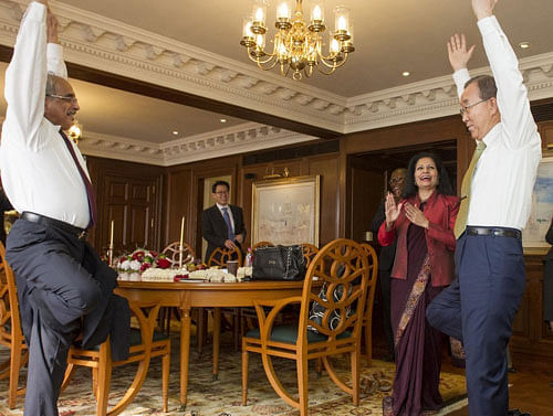 Ban Ki-moon gets a yoga lesson from Vijay Nambiar, Special Advisor. Photo courtesy: Twitter